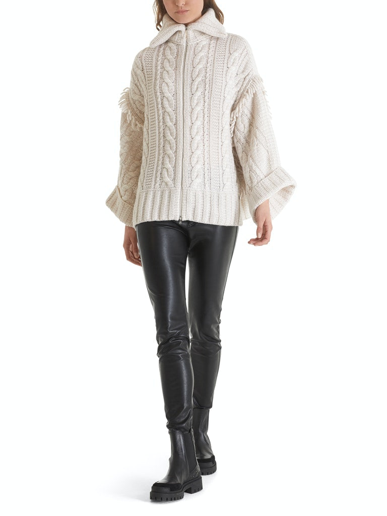 Cape Knitted in Germany