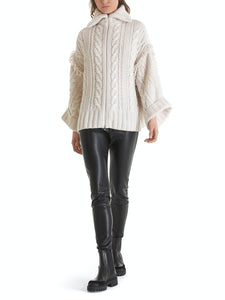 Cape Knitted in Germany