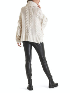 Cape Knitted in Germany