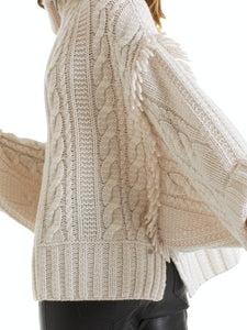 Cape Knitted in Germany