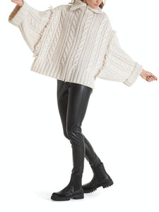Cape Knitted in Germany